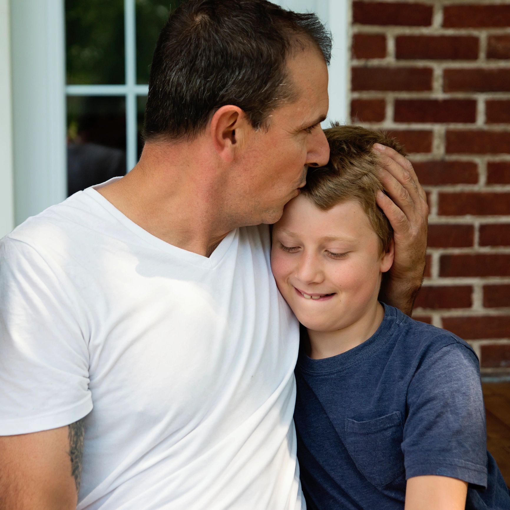Smiling father and child portrait