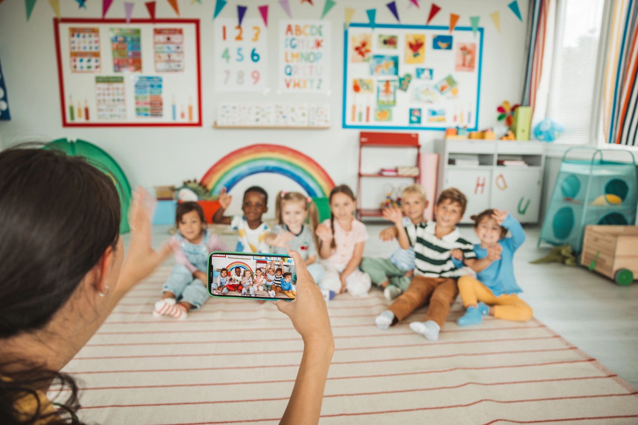 Teacher with students during playtime in a classroom