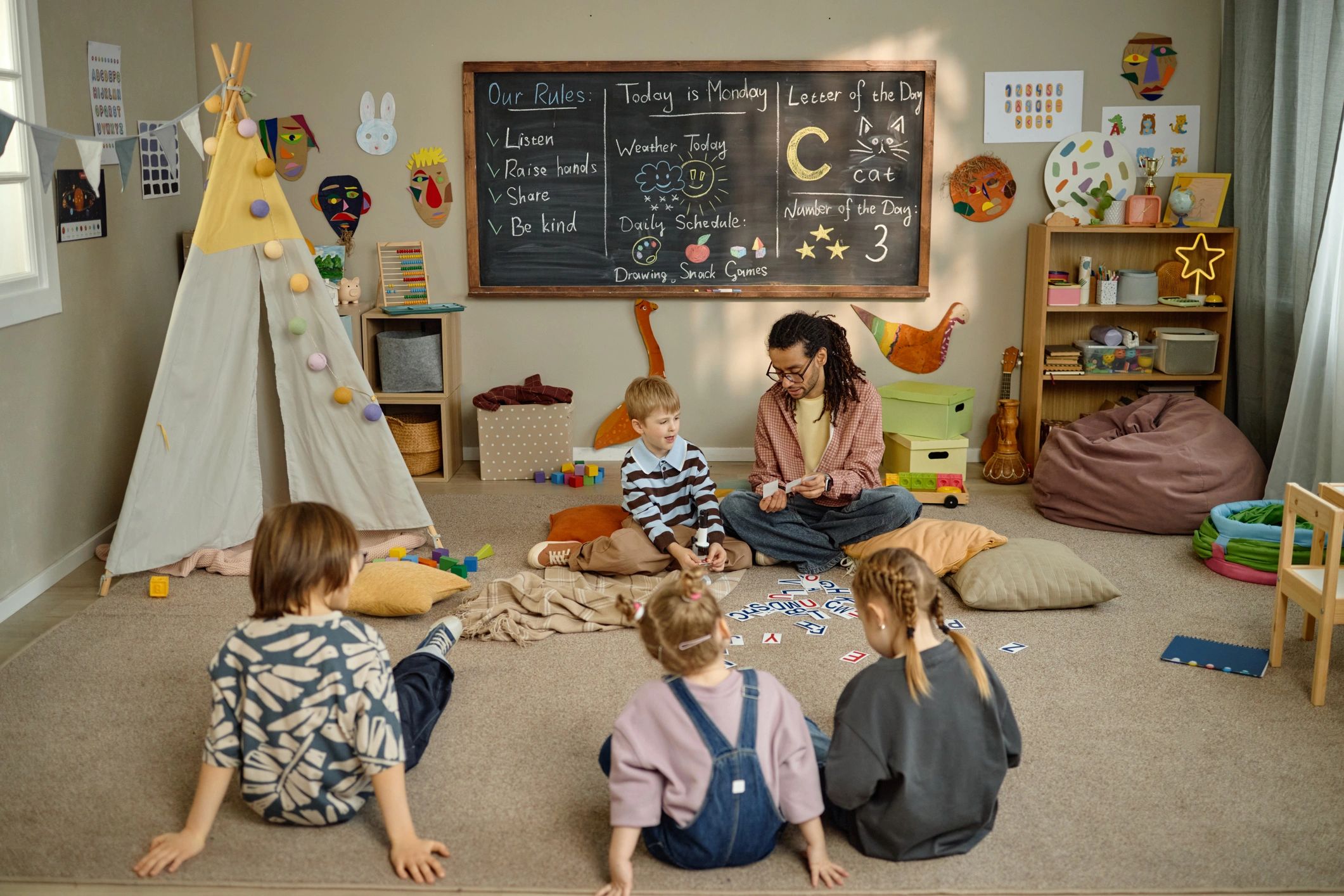 Teacher and children learning together in a classroom